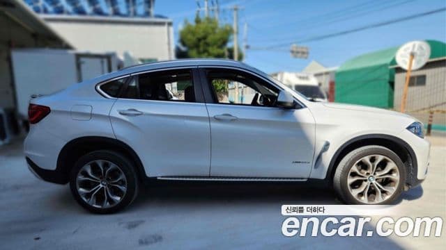 BMW X6 2018 — Фото 4/20
