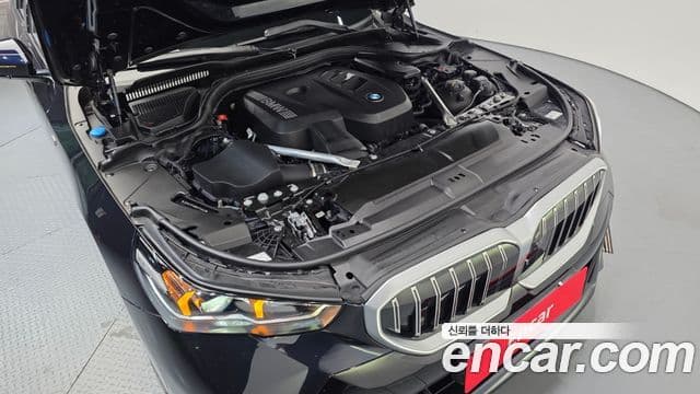 BMW 5 Series 2023 — ფოტო 6/20
