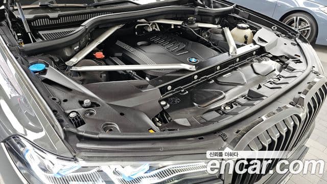 BMW X7 2022 — ფოტო 6/20