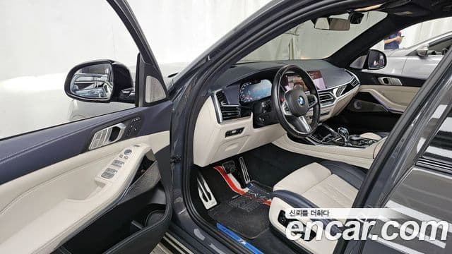 BMW X7 2022 — ფოტო 10/20