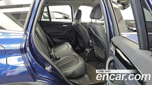 BMW X1 2019 — ფოტო 19/20