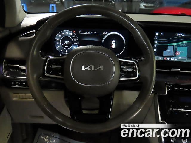 Kia Carnival 2023 — ფოტო 6/20