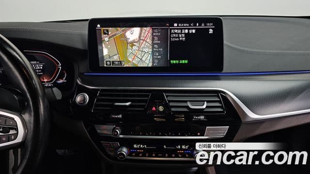 BMW 5 Series 2023 — Фото 12/20