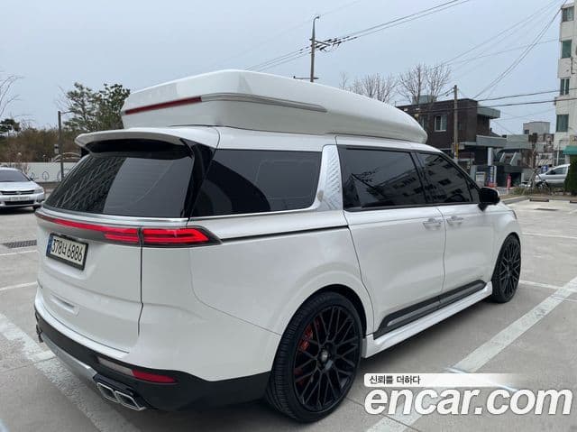 Kia Carnival 2021 — ფოტო 1/17