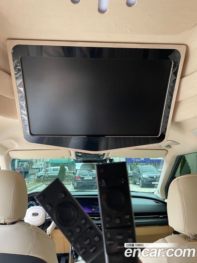 Kia Carnival 2021 — ფოტო 13/17