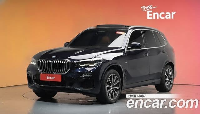 BMW X5 2019 — Фото 1/20