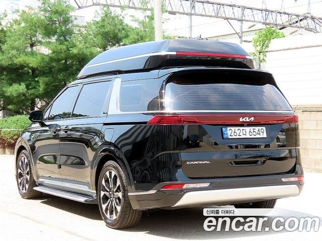 Kia Carnival 2022 — ფოტო 2/20