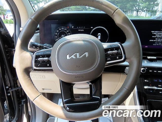 Kia Carnival 2022 — ფოტო 6/20