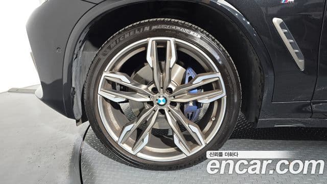 BMW X3 2021 — ფოტო 4/20