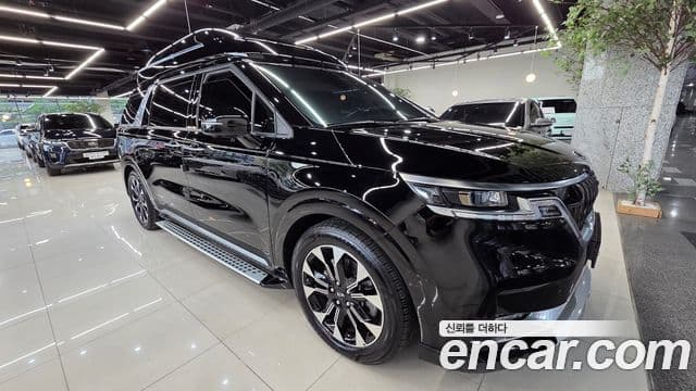 Kia Carnival 2021 — ფოტო 2/20