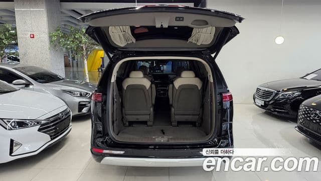 Kia Carnival 2021 — ფოტო 7/20
