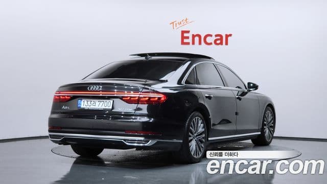 Audi A8 2021 — ფოტო 1/20