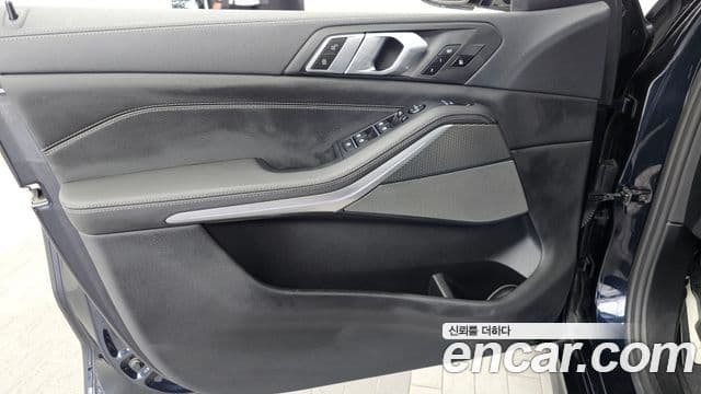 BMW X5 2021 — ფოტო 16/35