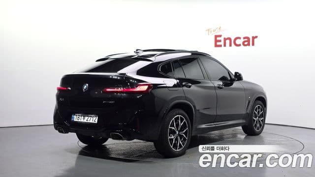 BMW X4 2023 — Фото 2/20