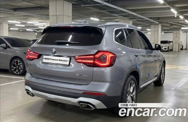 BMW X3 2022 — ფოტო 1/9
