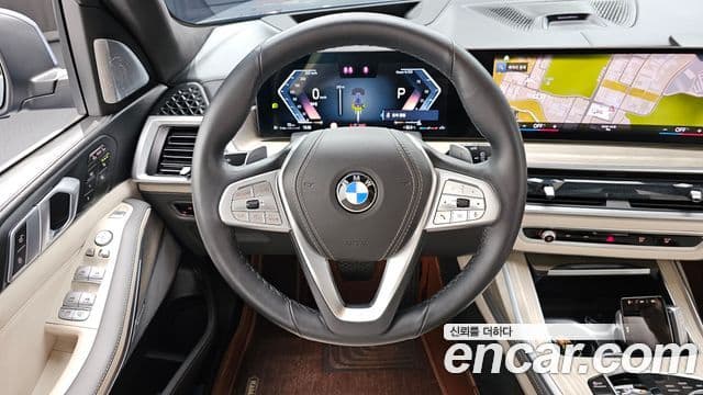 BMW X7 2023 — ფოტო 13/20
