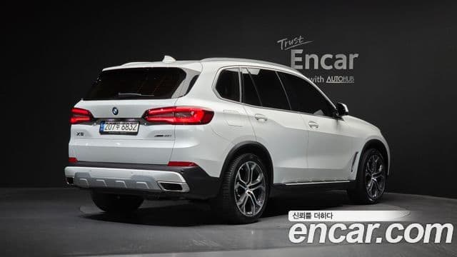 BMW X5 2022 — Фото 2/20