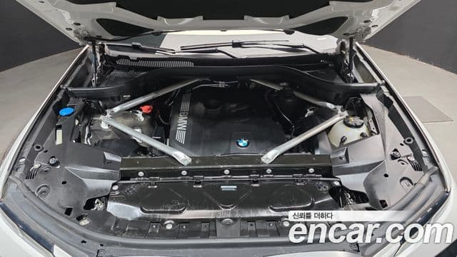 BMW X7 2023 — ფოტო 6/20