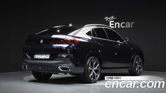 BMW X6 2022 — Фото 2/20