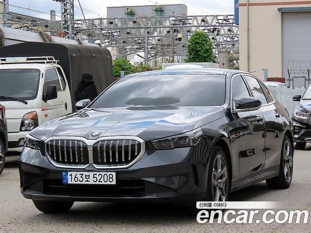 BMW 5 Series 2024 — ფოტო 1/20