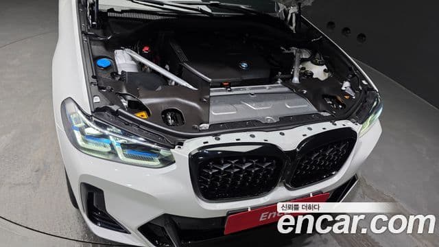 BMW X4 2025 — ფოტო 8/20