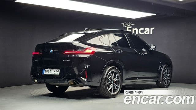 BMW X4 2023 — Фото 2/20