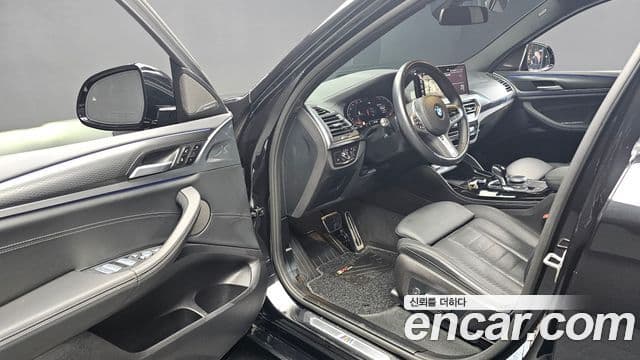 BMW X4 2023 — Фото 10/20