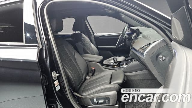BMW X4 2023 — Фото 11/20