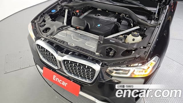 BMW X4 2023 — ფოტო 6/20