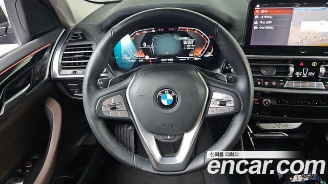 BMW X4 2023 — ფოტო 14/20