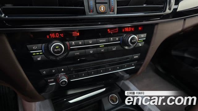 BMW X5 2018 — ფოტო 16/20