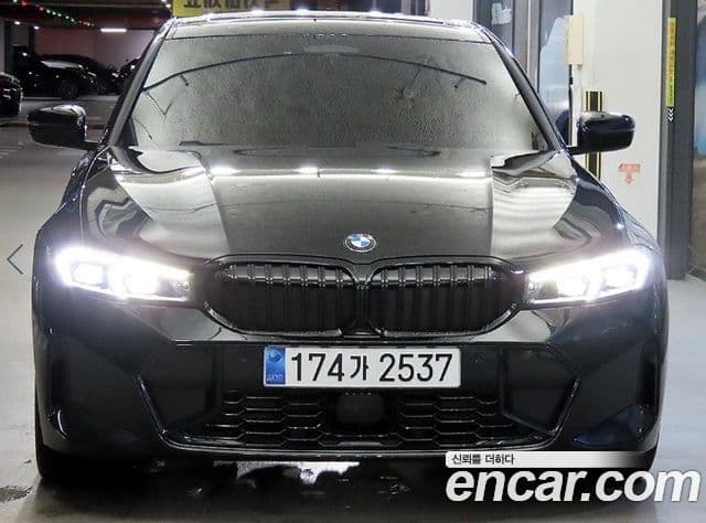 BMW 3 Series 2023 — ფოტო 1/2