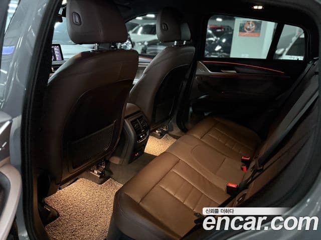 BMW X4 2023 — ფოტო 7/20