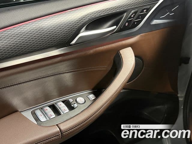 BMW X4 2023 — ფოტო 16/20