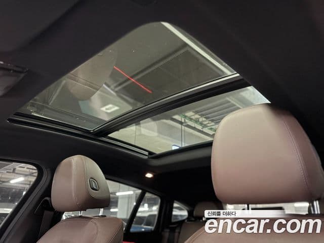 BMW X4 2023 — ფოტო 18/20