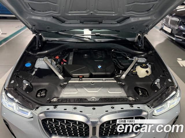 BMW X4 2023 — ფოტო 19/20