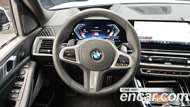BMW X5 2025 — ფოტო 13/20