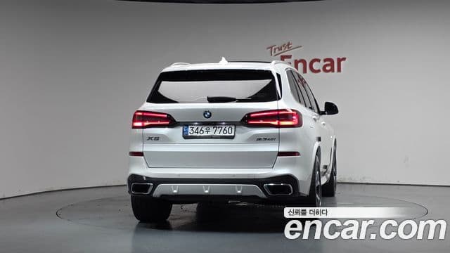 BMW X5 2021 — ფოტო 4/20