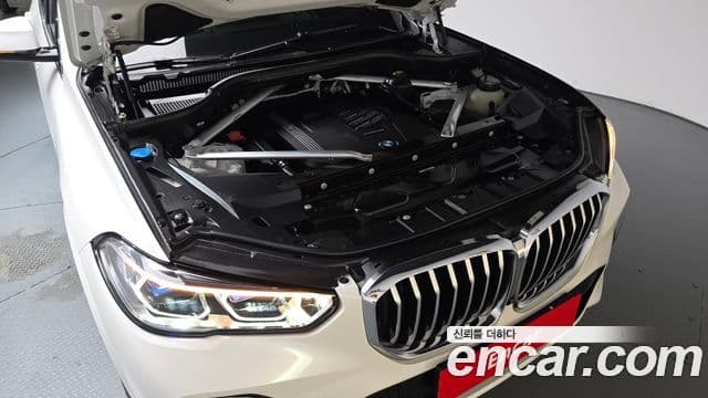 BMW X5 2021 — ფოტო 6/20
