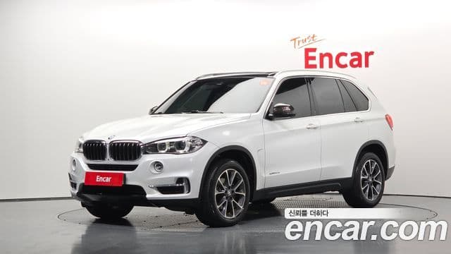 BMW X5 2018 — Фото 1/20