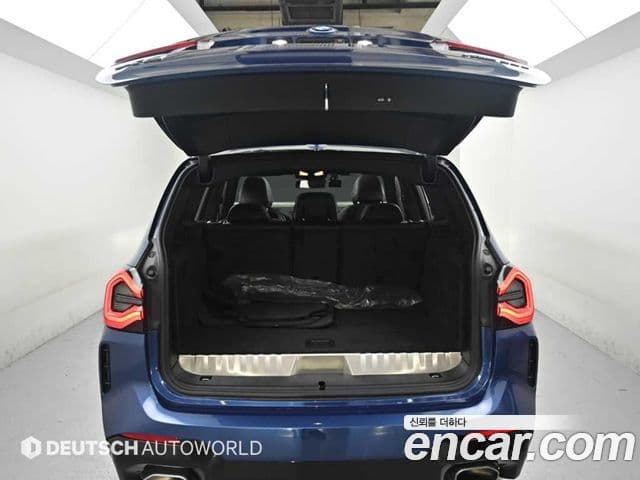 BMW X3 2021 — ფოტო 14/20