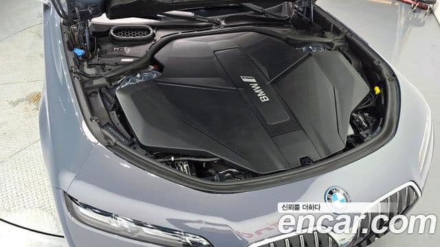 BMW i7 2023 — ფოტო 26/34