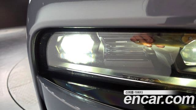 BMW i7 2023 — ფოტო 21/34