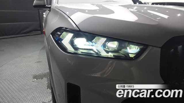 BMW X5 2023 — ფოტო 19/33