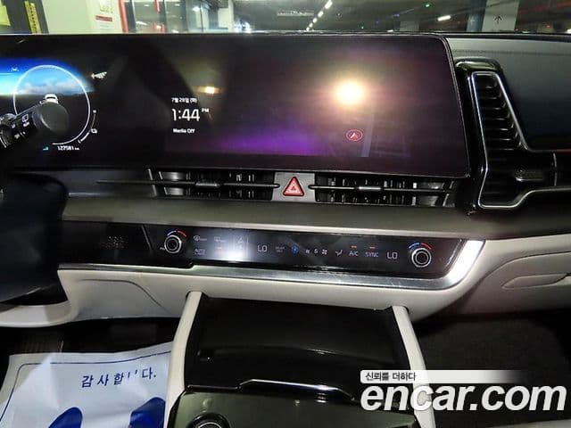 Kia Sportage 2021 — ფოტო 6/20