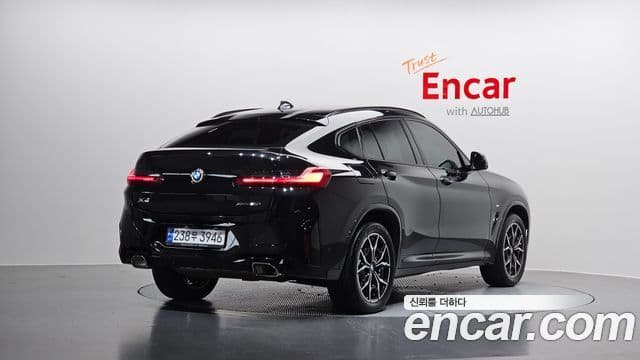BMW X4 2023 — Фото 2/20