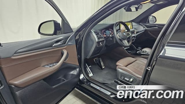 BMW X4 2023 — Фото 10/20