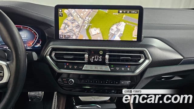 BMW X4 2023 — Фото 12/20