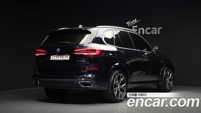 BMW X5 2022 — ფოტო 27/33