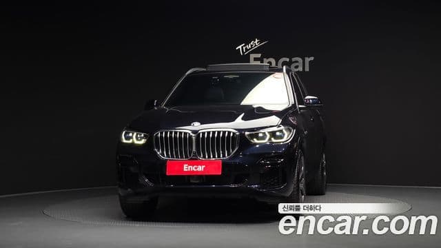 BMW X5 2022 — ფოტო 29/33
